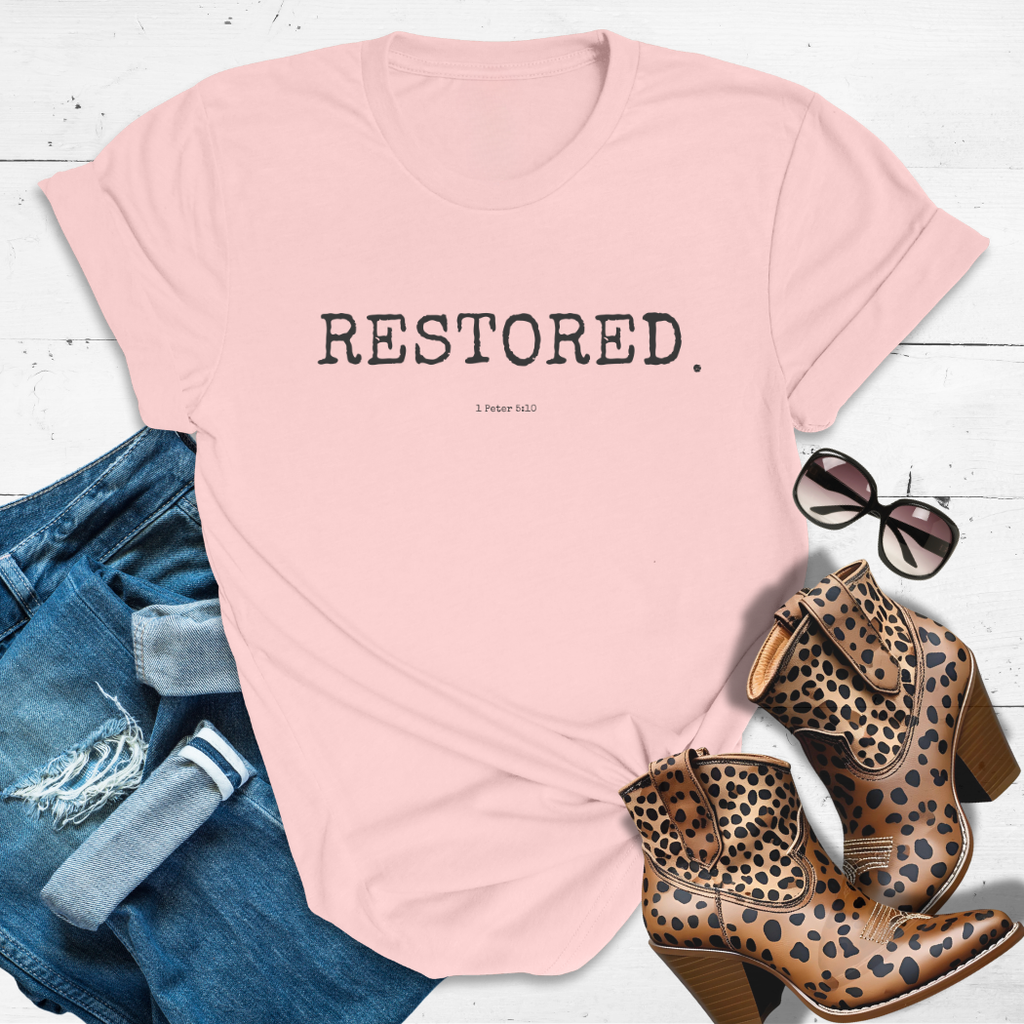 RESTORED.™ Tee — Healed. Whole. Held together by grace.