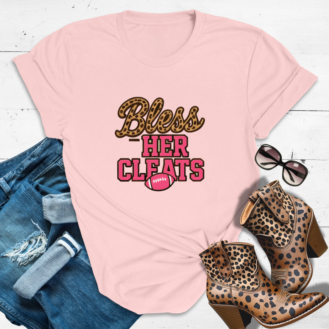 BLESS HER CLEATS.™ – “Leopard print never lost a game.”