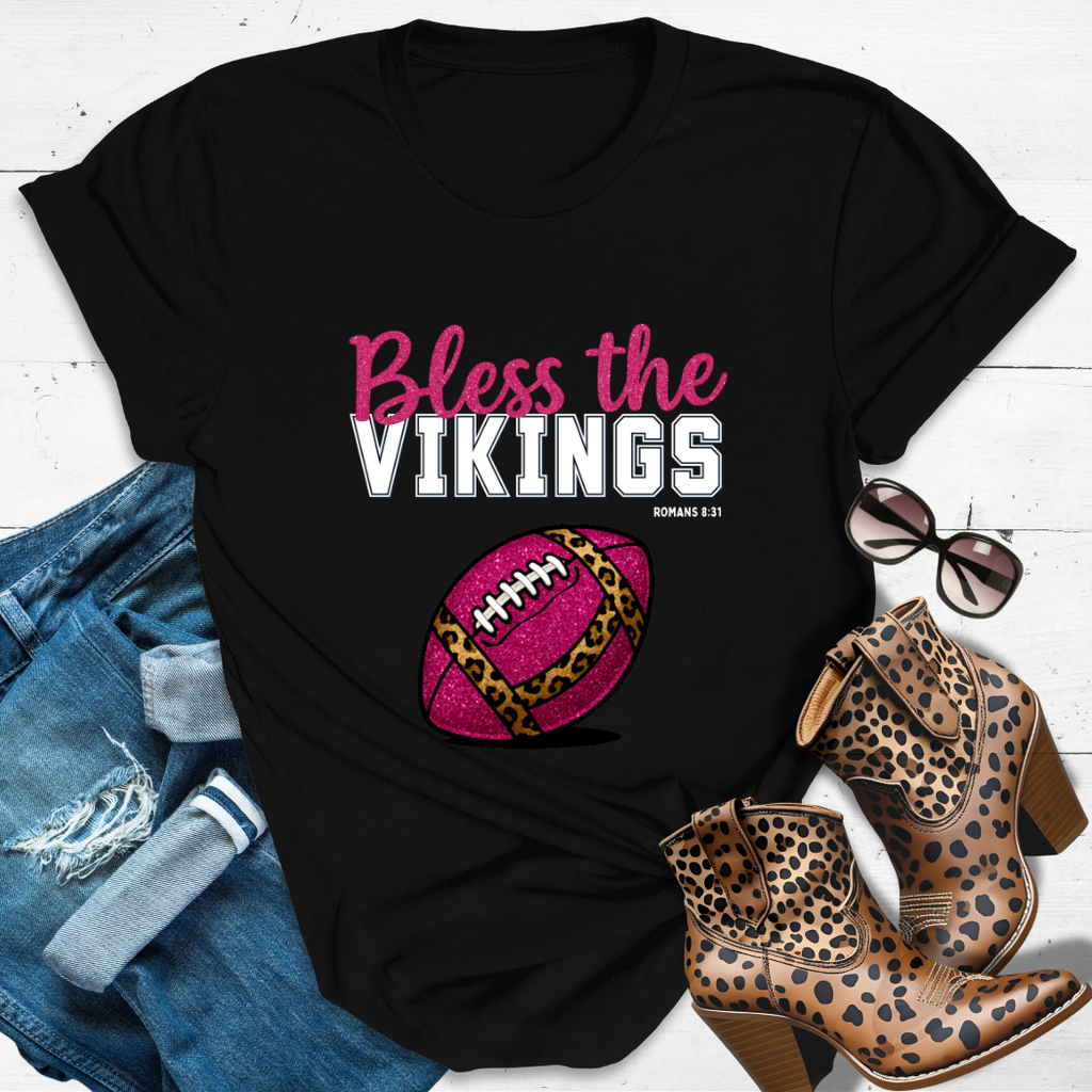 BLESS THE VIKINGS™ Tee — Heaven’s got favorites — and she’s loud in the stands.