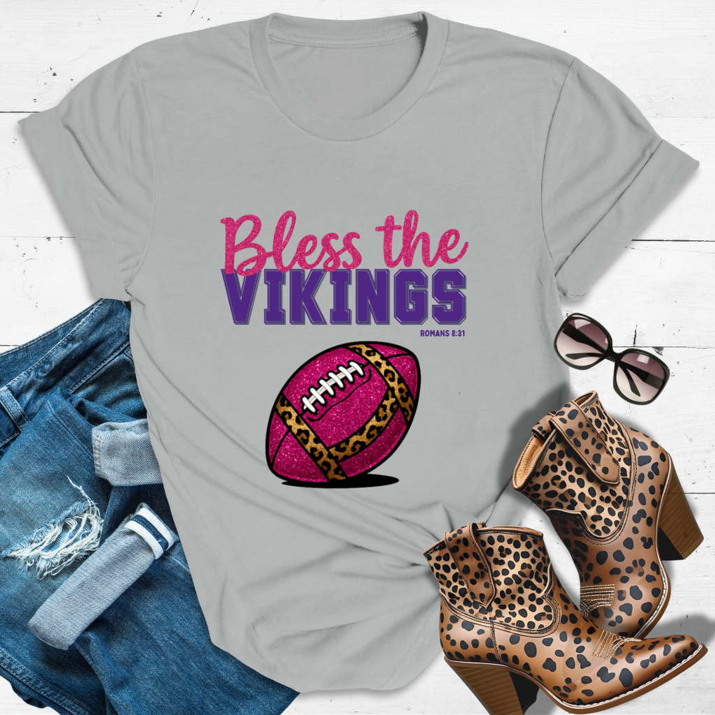 BLESS THE VIKINGS™ Tee — Heaven’s got favorites — and she’s loud in the stands.