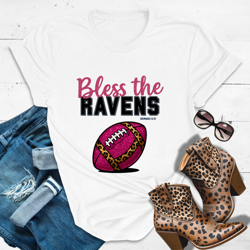 BLESS THE RAVENS™ Tee — Heaven’s got favorites — and she’s loud in the stands.
