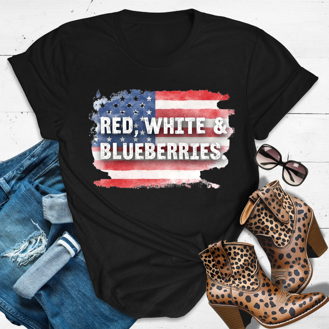 "Red White & Blueberries Charlie Kirk legacy tribute tee in black flatlay with denim shorts – Christian women’s shirt by She Laughs™